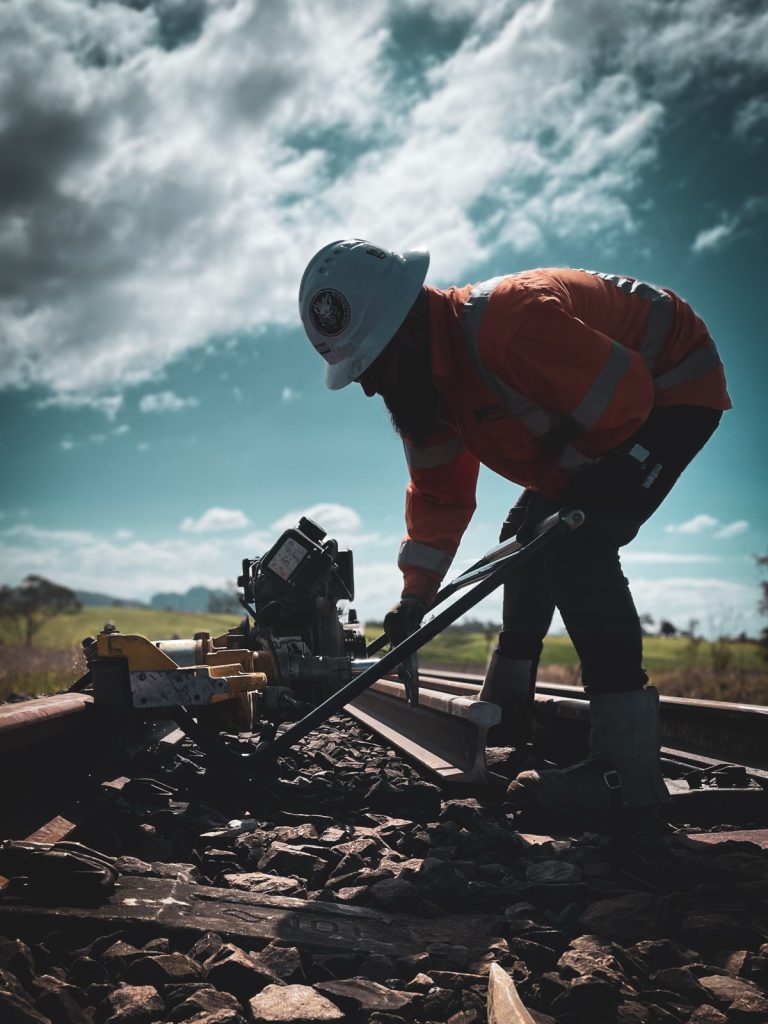Rail infrastructure project team collaborating to deliver safe and efficient construction outcomes across Australia