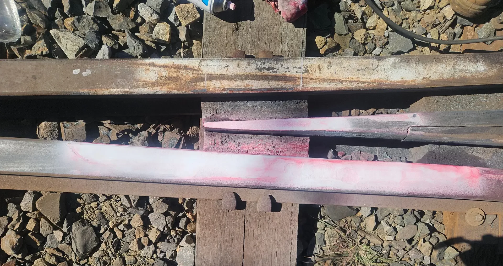 Railway rail marked during inspection to identify a suspected crack requiring further assessment