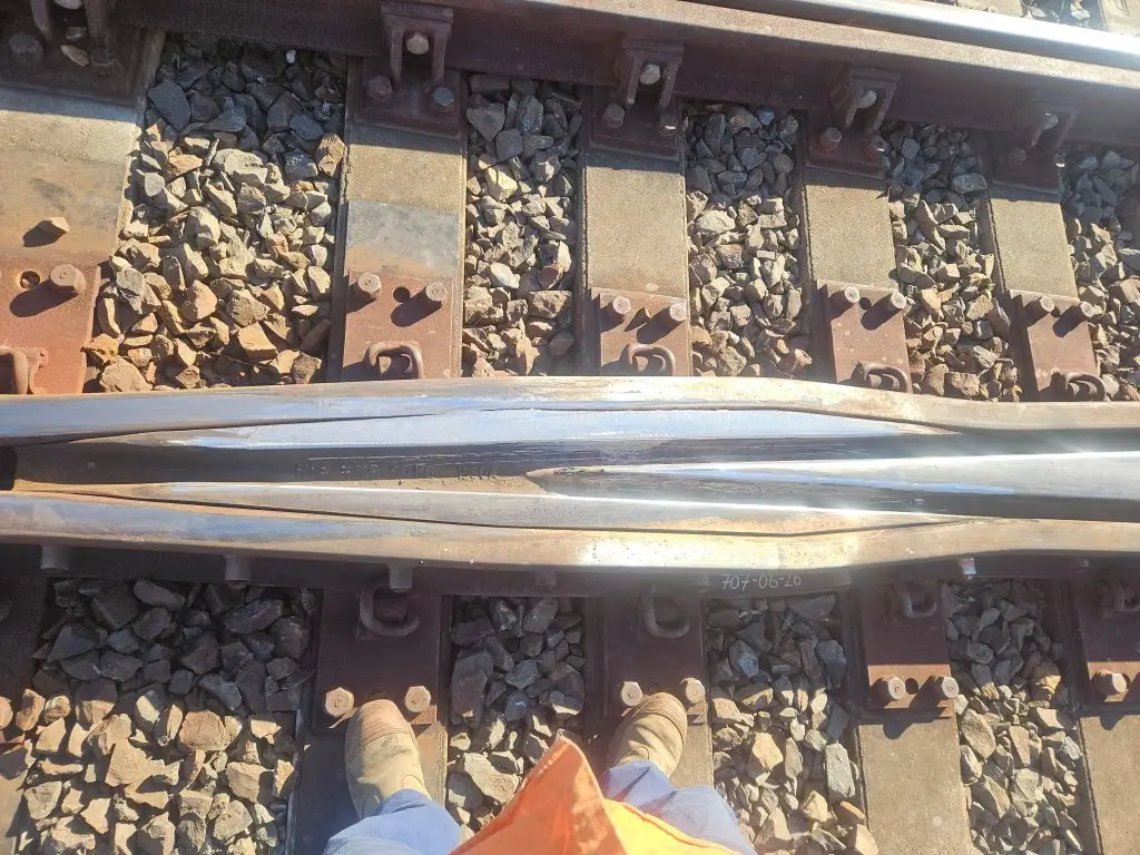 Finished rail welding joint prepared to achieve a smooth and precise railway running surface