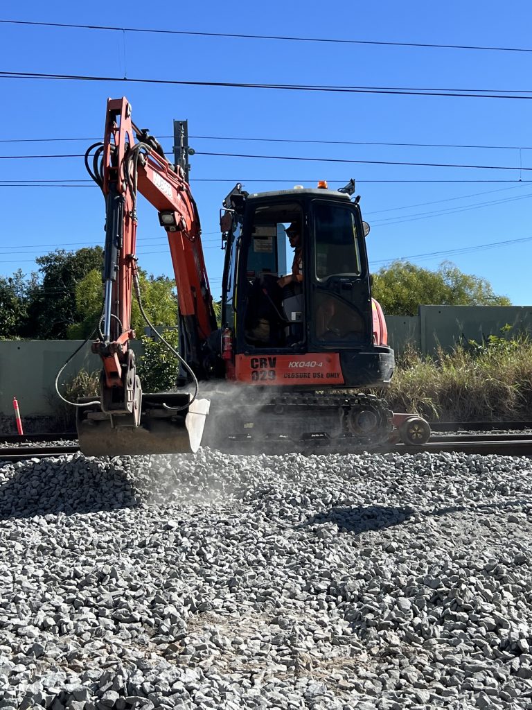 Excavator operator completing civil construction works