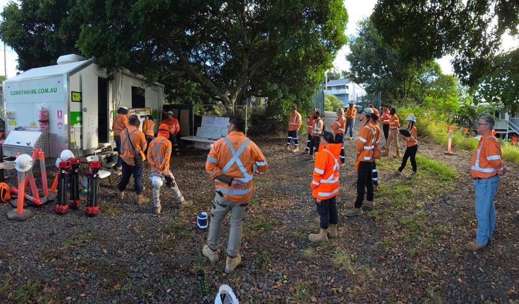 Rail workers attending a prestart safety briefing before entering a rail corridor