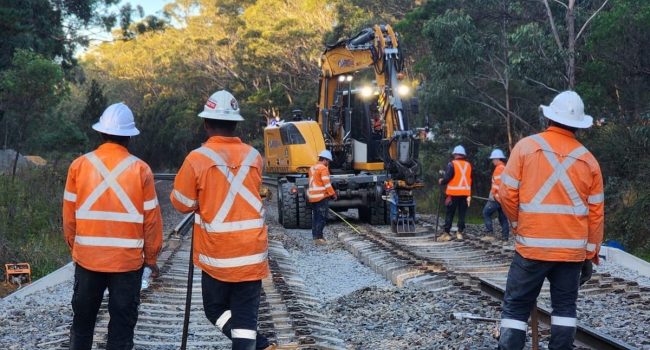Rail labour hire crew completing track maintenance on an Australian railway project
