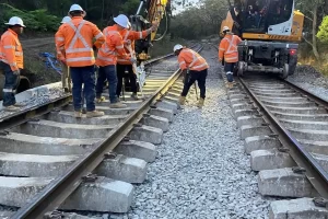 Rail crew completing railway track renewal works in Australia