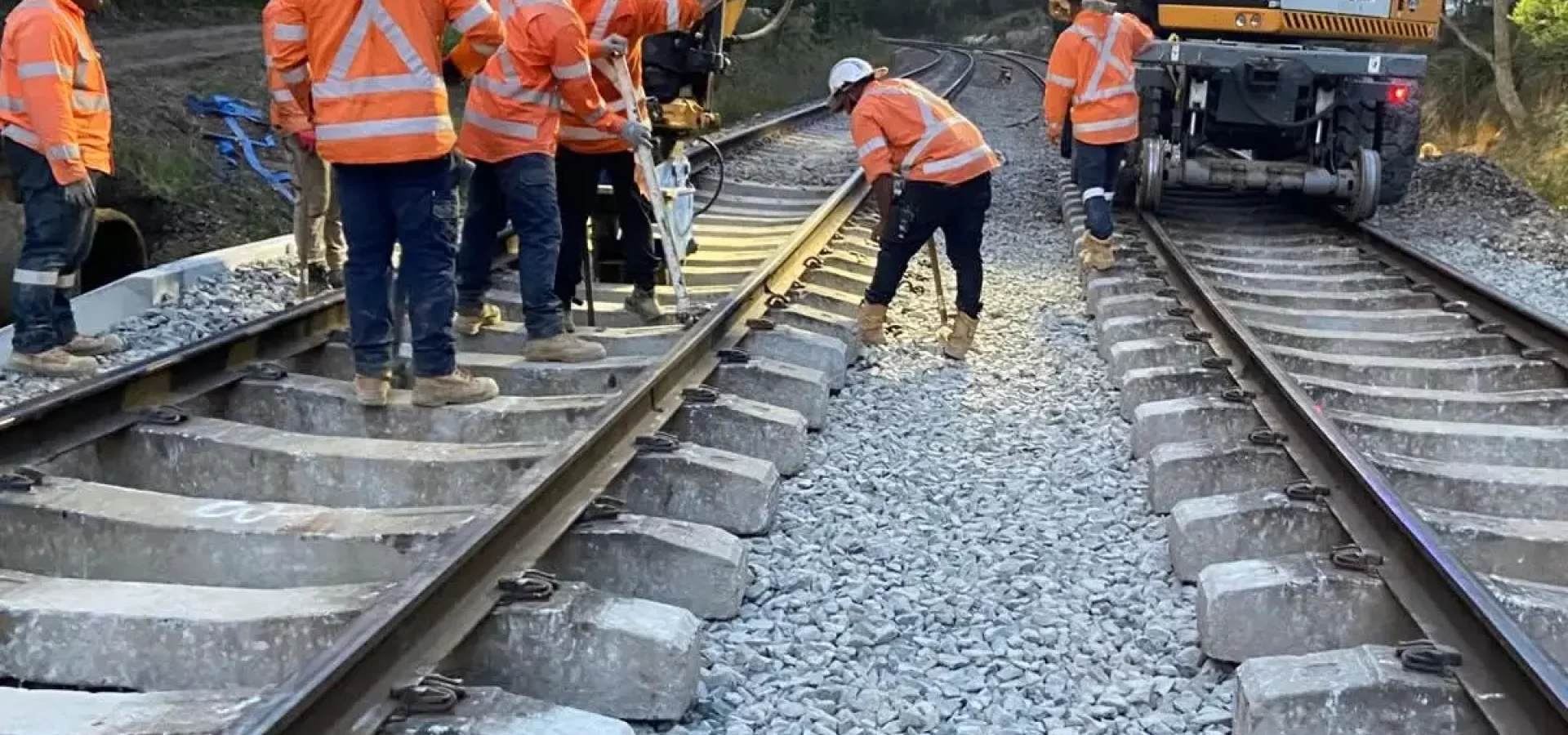 Rail crew completing railway track renewal works in Australia